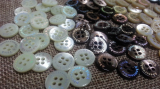 shell buttons with Hologram logo